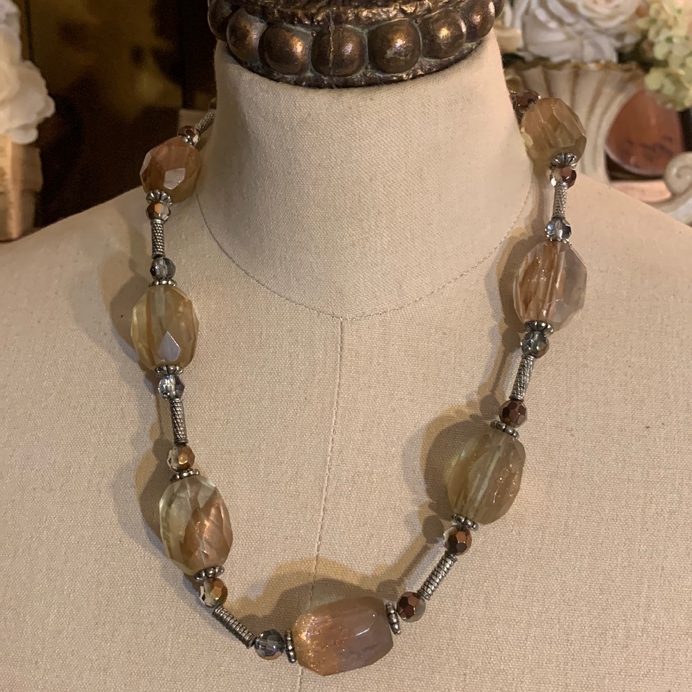 Heavy statement necklace with large shimmering stones